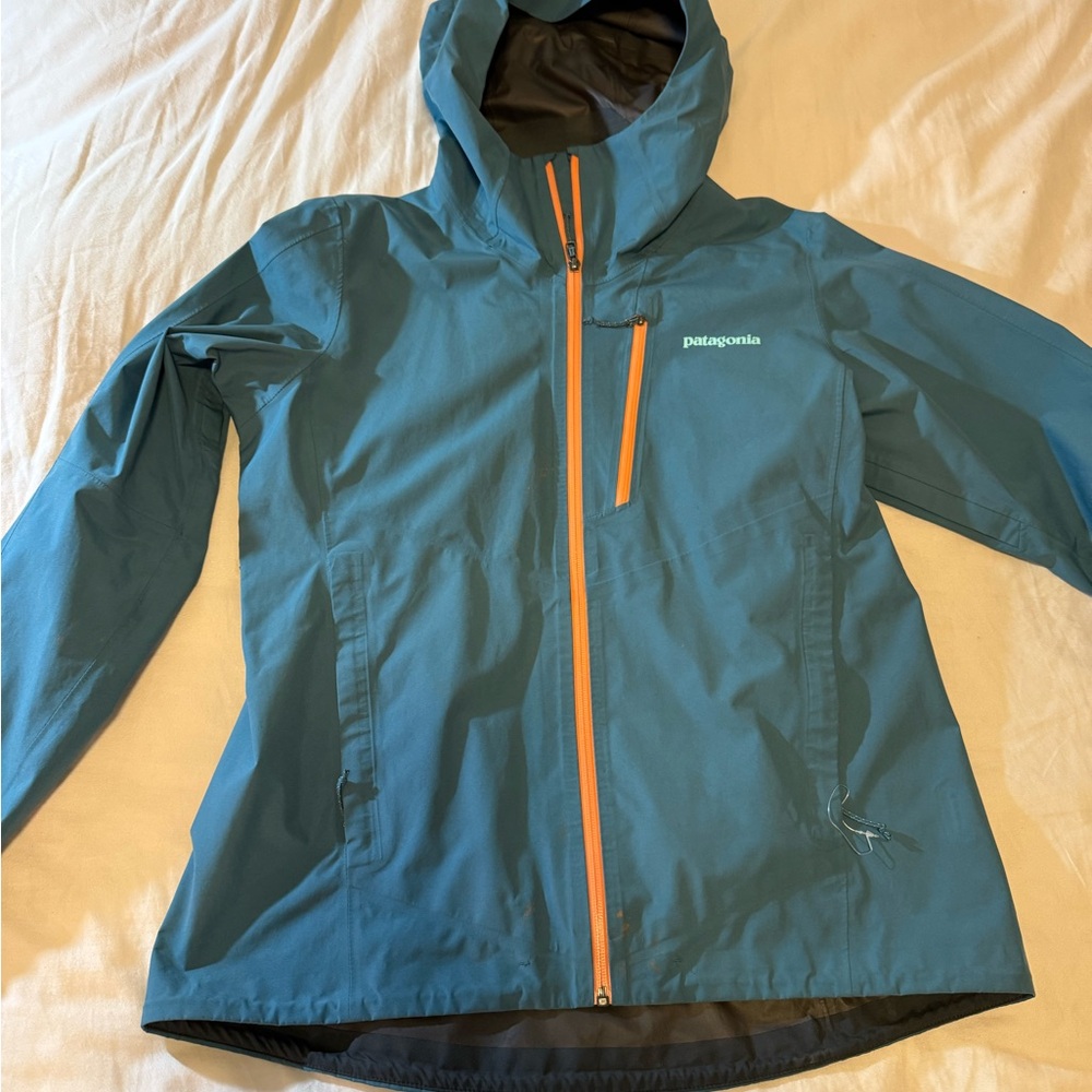 Patagonia Teal Jacket with Vibrant Orange Zipper